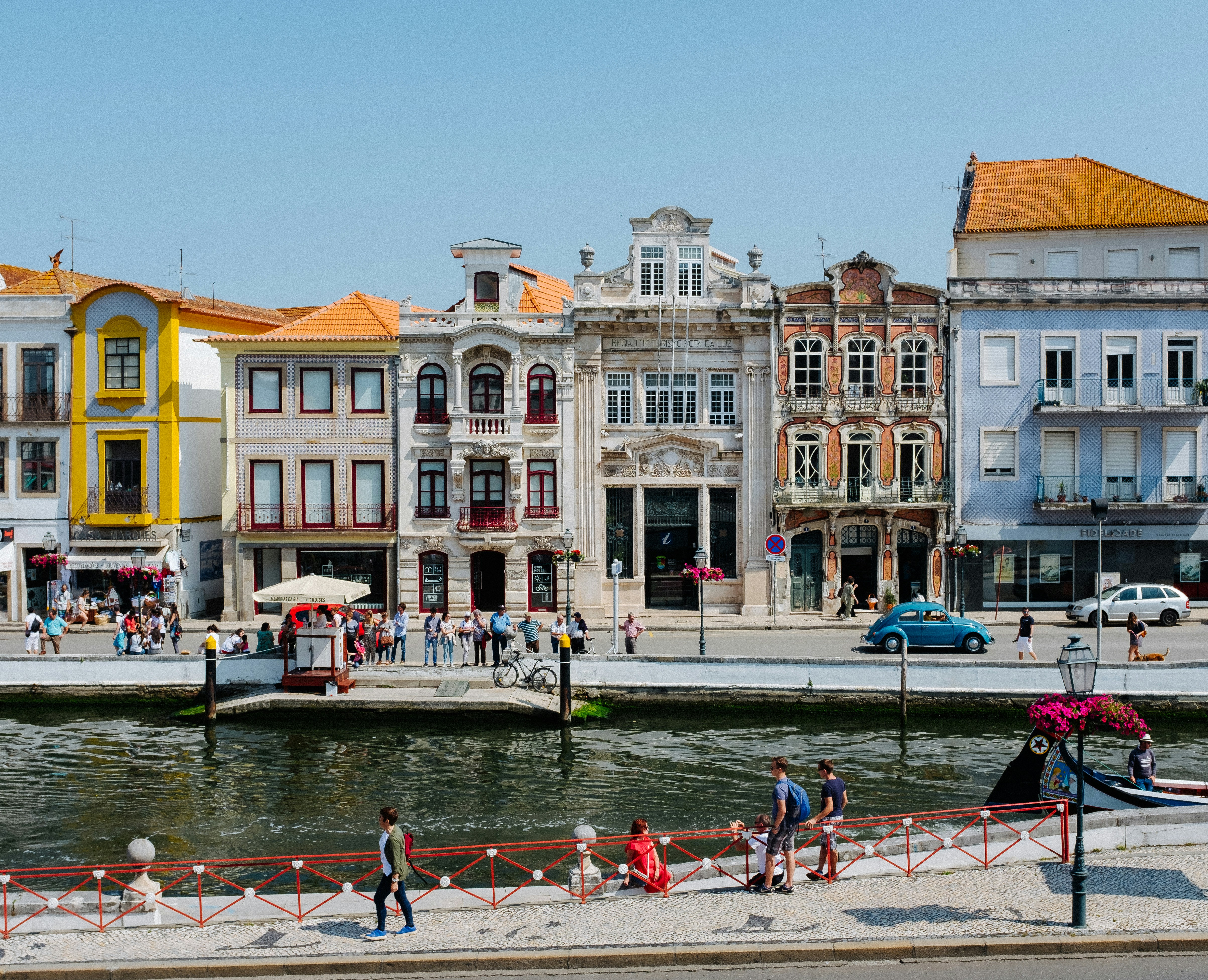 Colorful Art Nouveau buildings line the canal in Aveiro, Portugal
